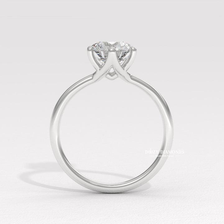 Classic round solitaire engagement ring crafted for everyday wear