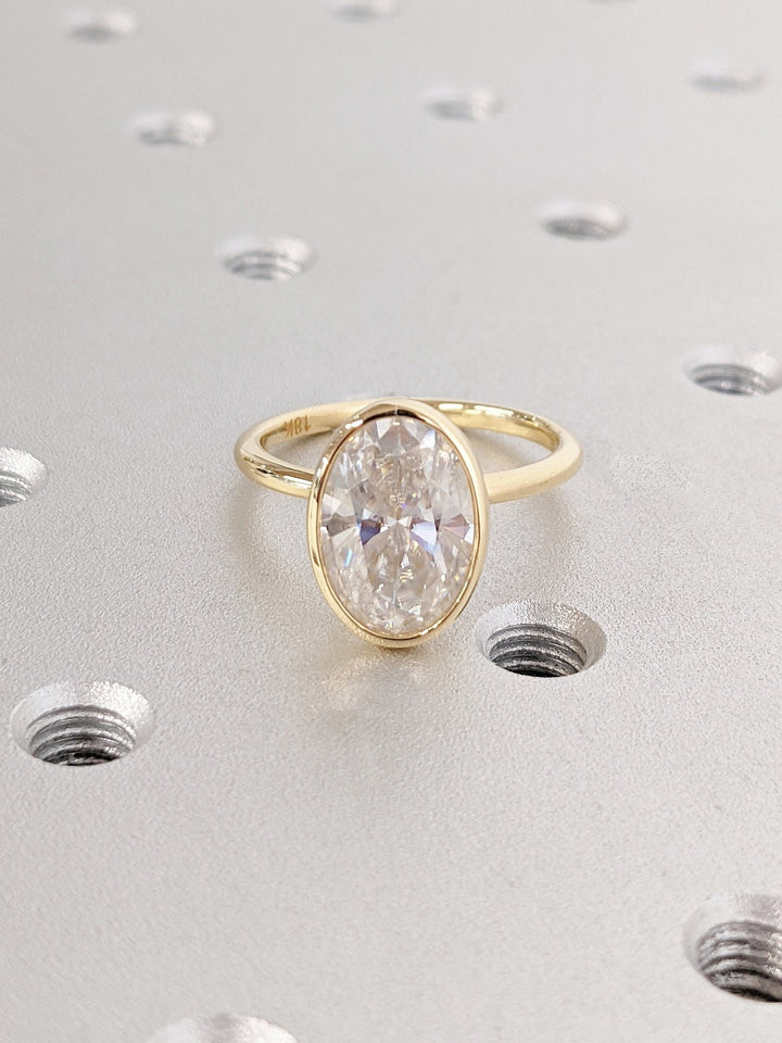 Shop oval cut bezel lab grown diamond engagement ring online