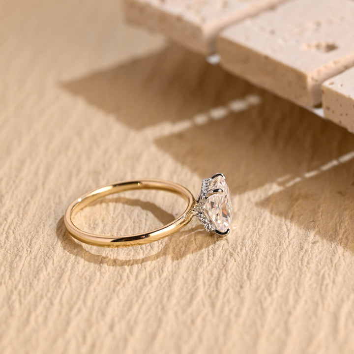 Angled view of radiant cut diamond in hidden halo setting