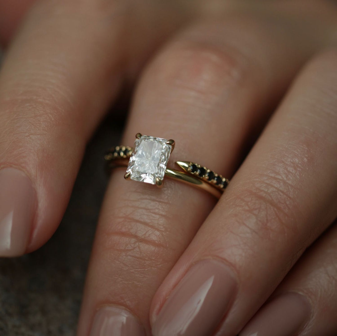 Angled view of radiant cut diamond in solitaire setting