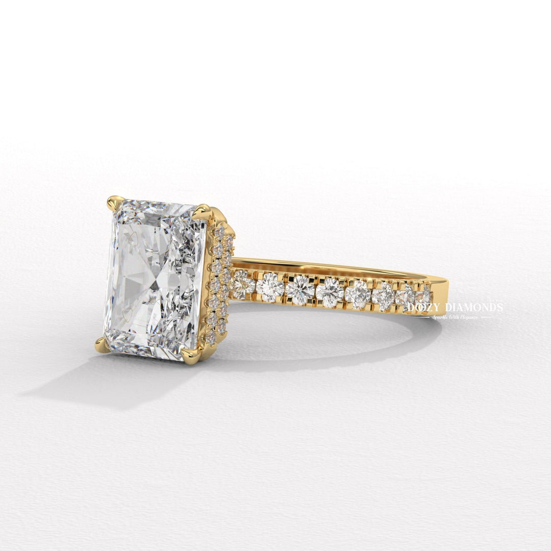 Radiant cut diamond ring worn on hand