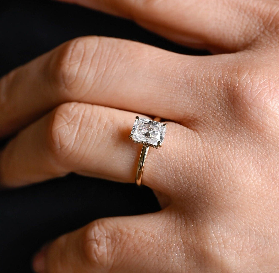 Detailed close-up of radiant hidden halo diamond engagement ring