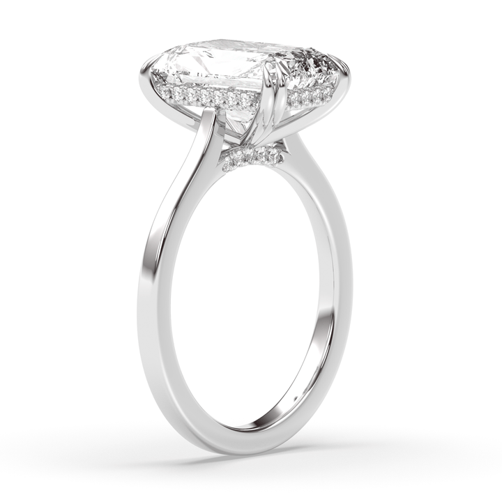 Radiant hidden halo ring set with an IGI graded diamond