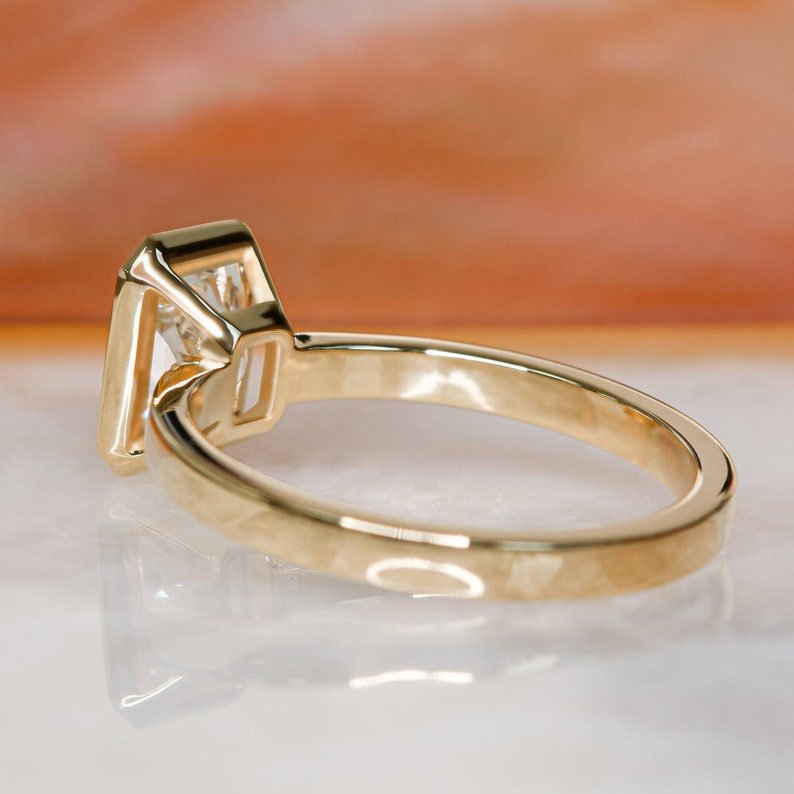 Radiant bezel engagement ring close-up highlighting diamond sparkle