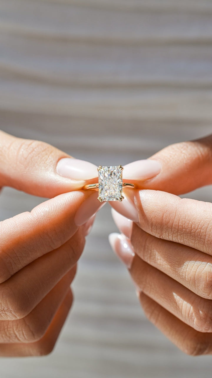 Radiant cut diamond ring worn on hand