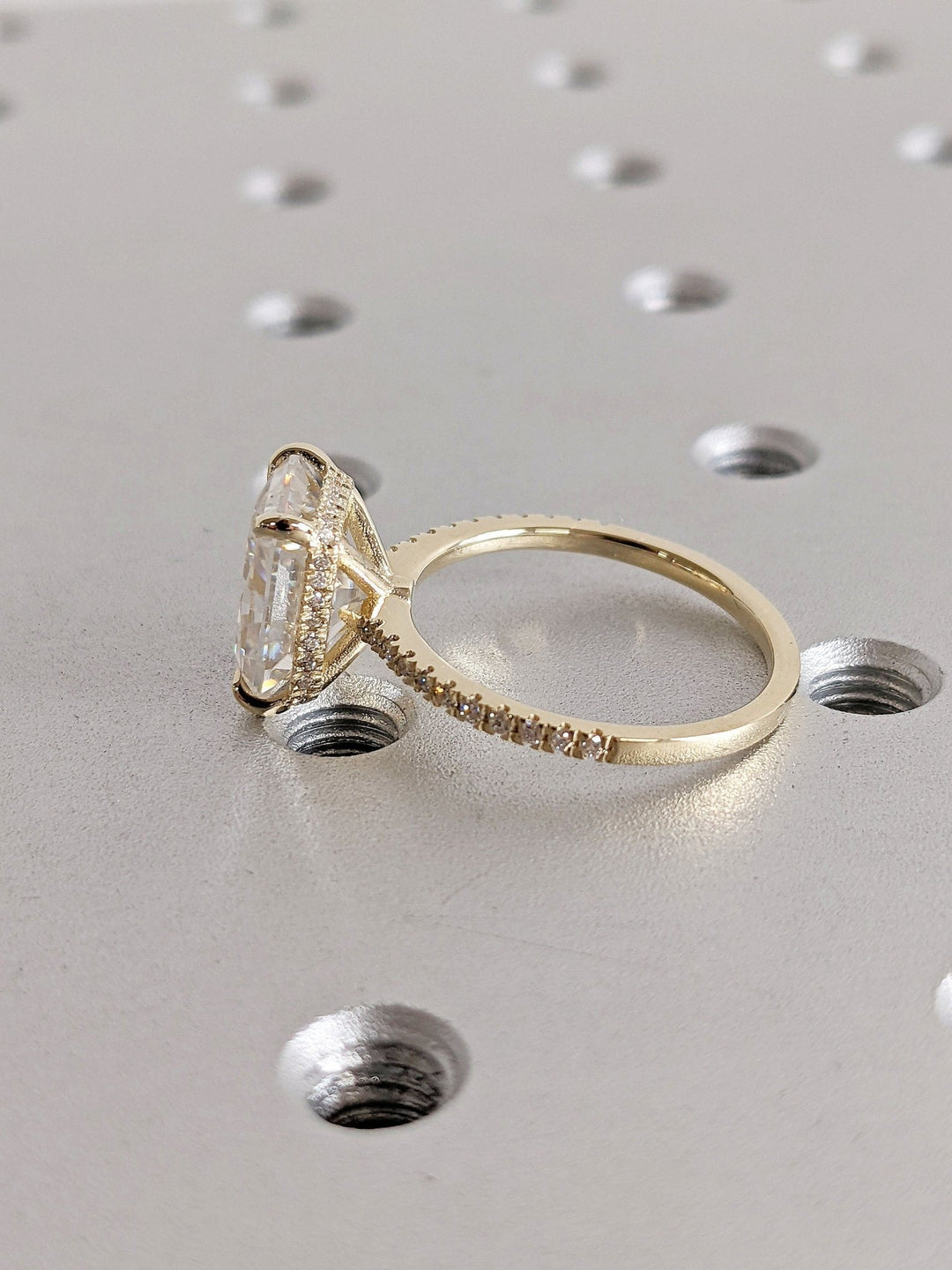 Radiant hidden halo lab grown diamond ring fitted on finger