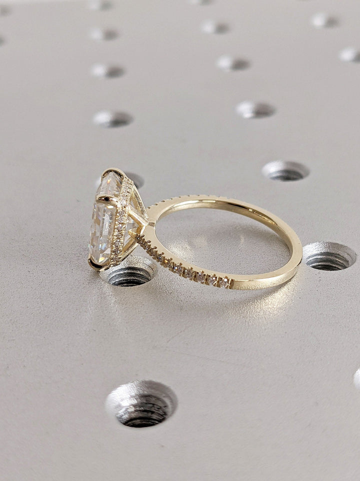 Radiant hidden halo lab grown diamond ring fitted on finger