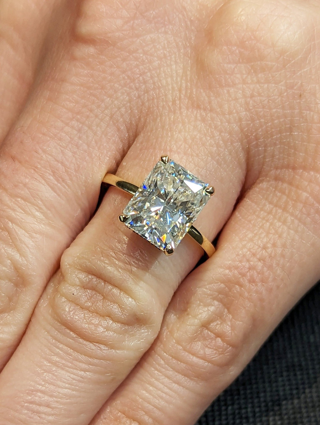 Handcrafted radiant cut hidden halo lab grown diamond engagement ring