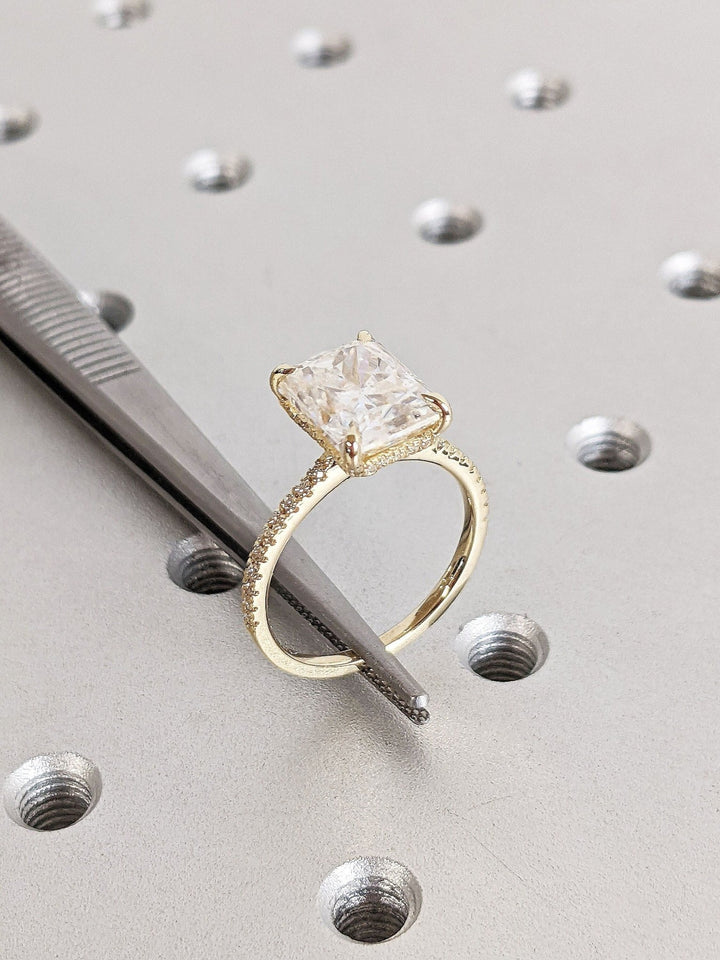 IGI certified radiant cut diamond in hidden halo engagement ring setting