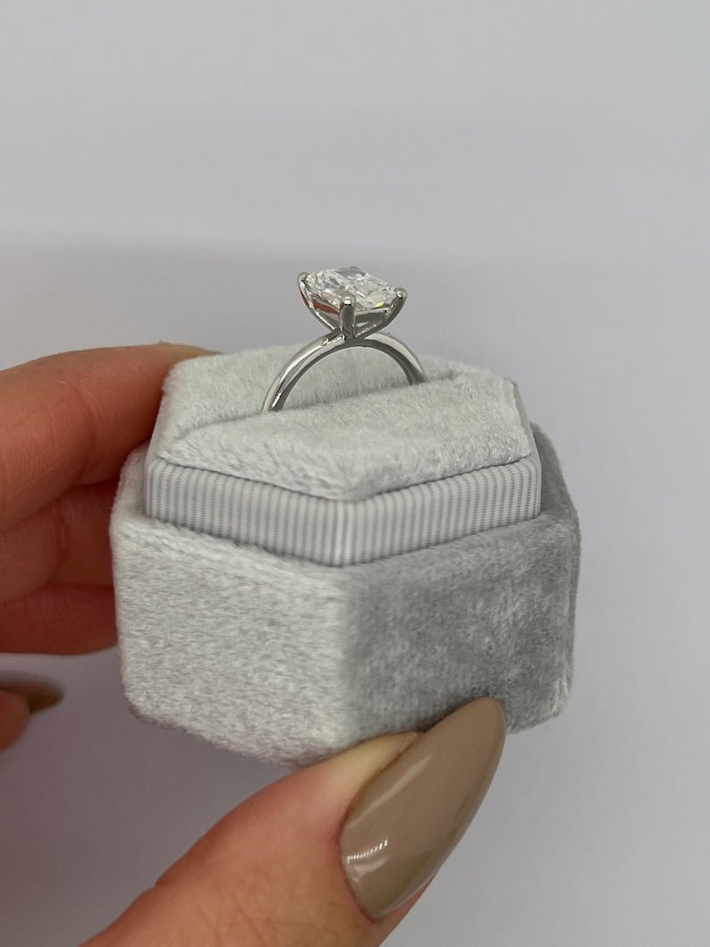 Macro shot of radiant cut diamond facets in solitaire ring setting