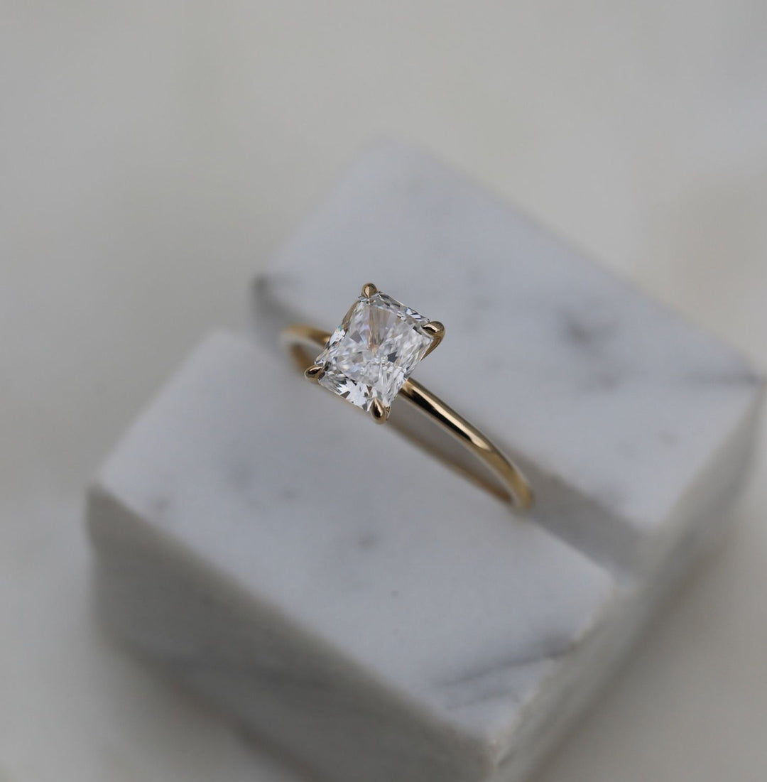 Classic radiant solitaire engagement ring crafted for everyday wear