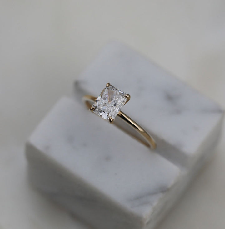 Classic radiant solitaire engagement ring crafted for everyday wear