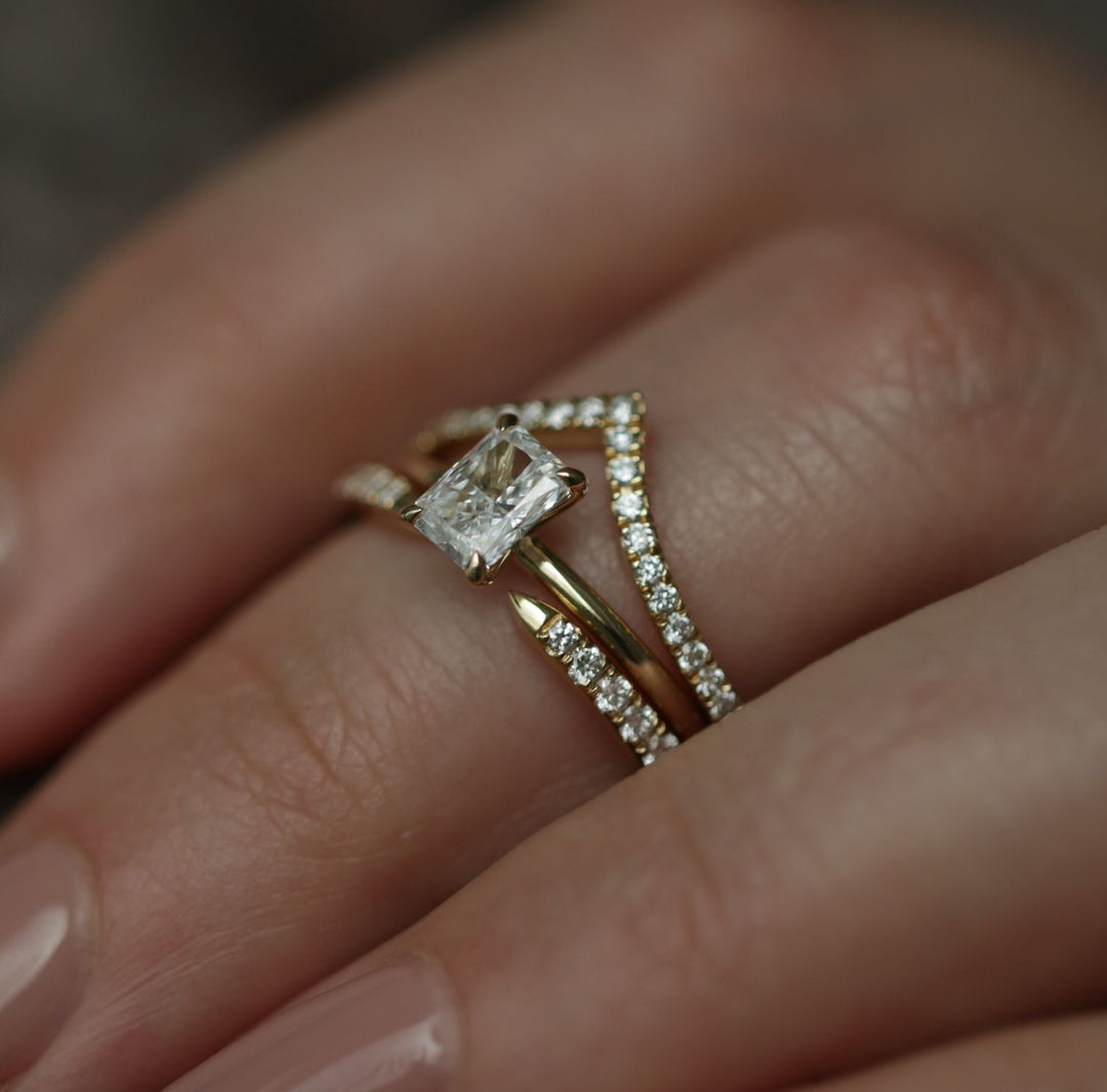 Radiant cut diamond ring worn on hand
