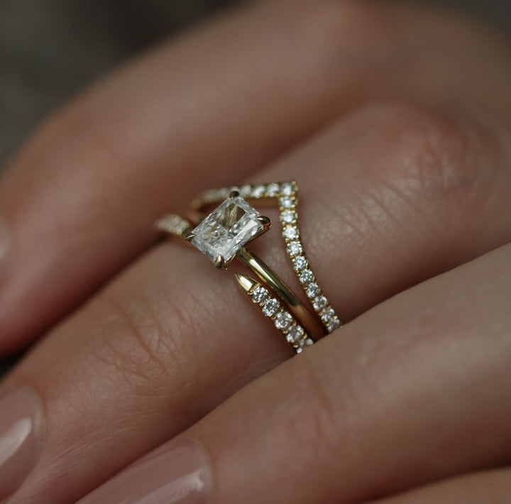 Radiant cut diamond ring worn on hand