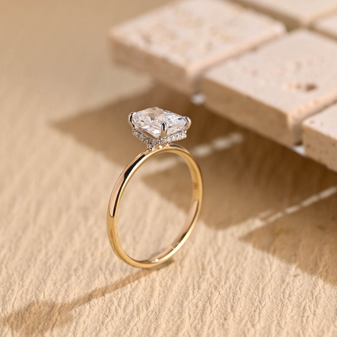 Radiant hidden halo engagement ring close-up highlighting diamond sparkle