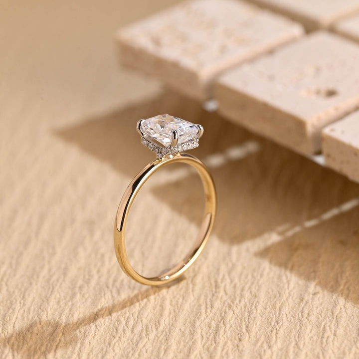 Radiant hidden halo engagement ring close-up highlighting diamond sparkle