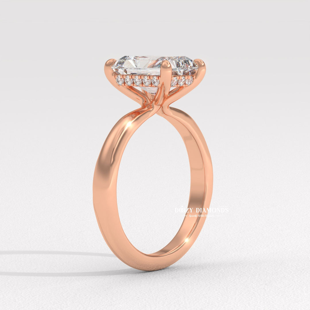 Radiant cut diamond ring worn on hand