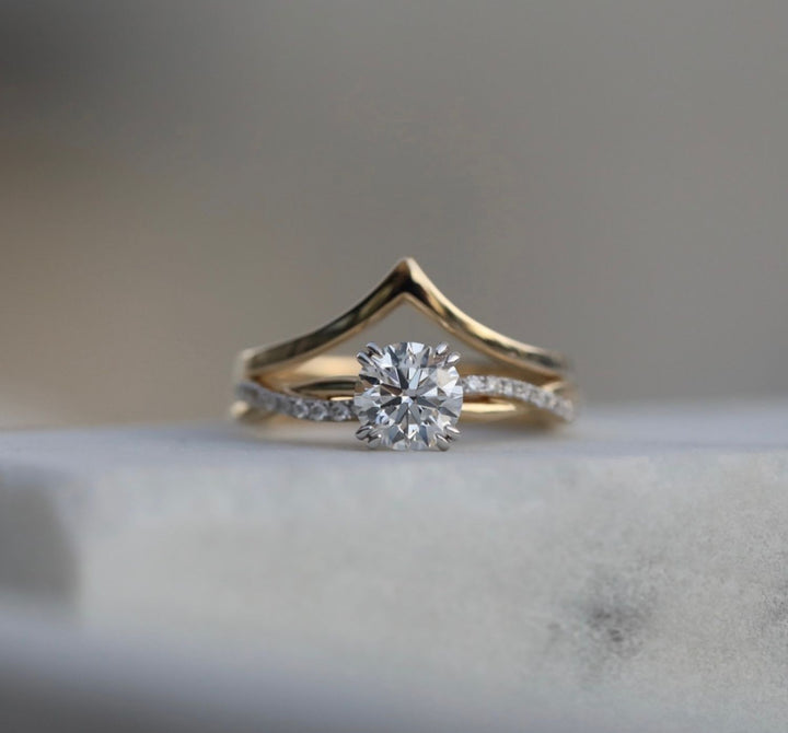 Macro shot of round cut diamond facets in solitaire ring setting