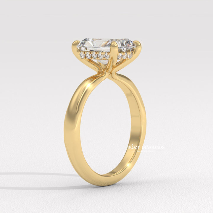 Macro shot of radiant cut diamond facets in hidden halo ring setting
