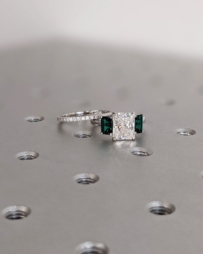 Shop the radiant cut three stone engagement ring collection online