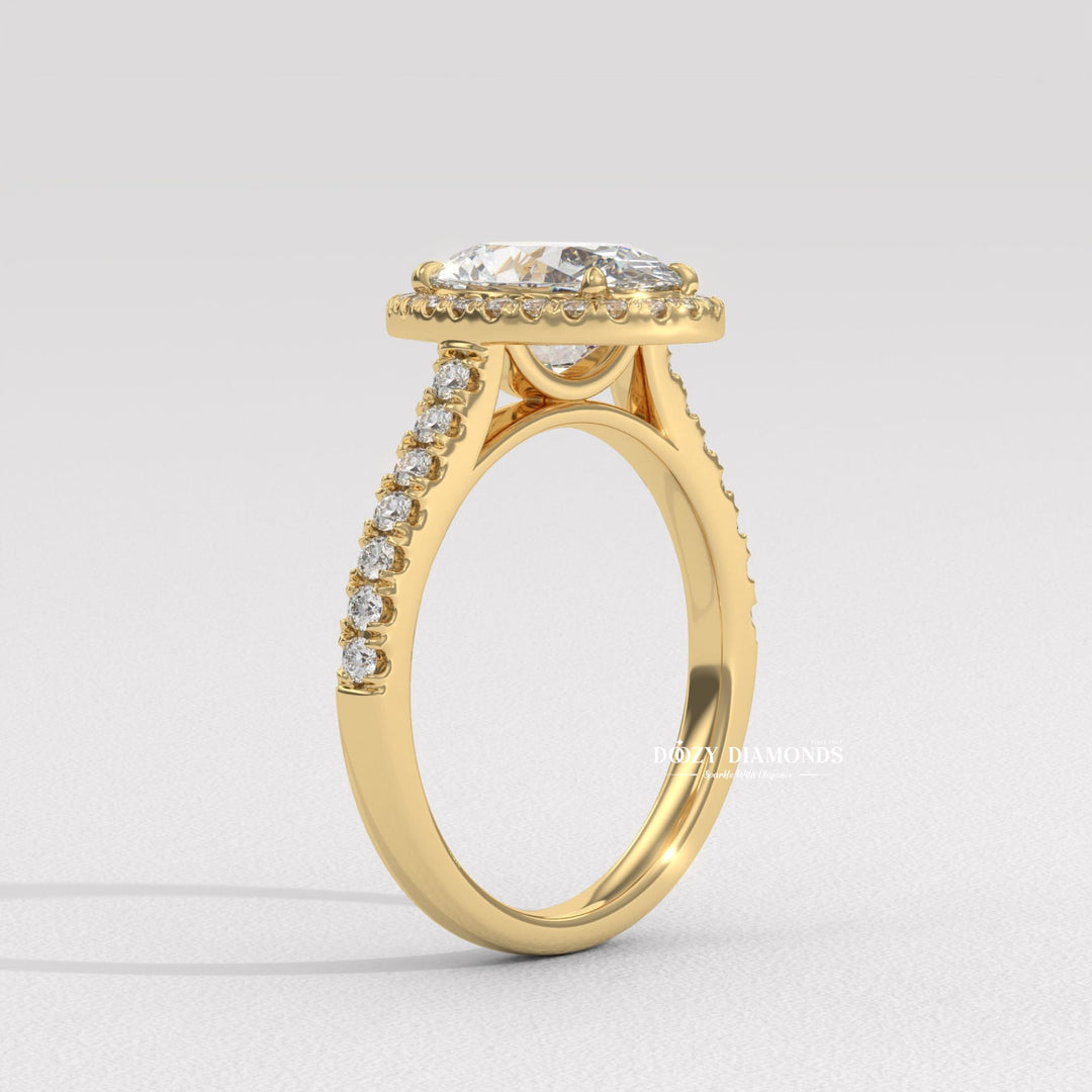 Oval halo lab grown diamond ring fitted on finger