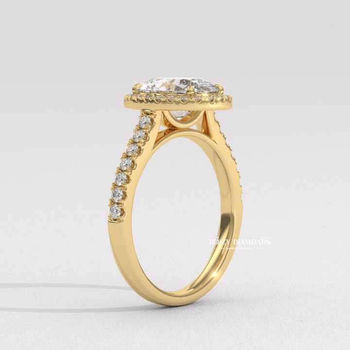 Oval halo lab grown diamond ring fitted on finger