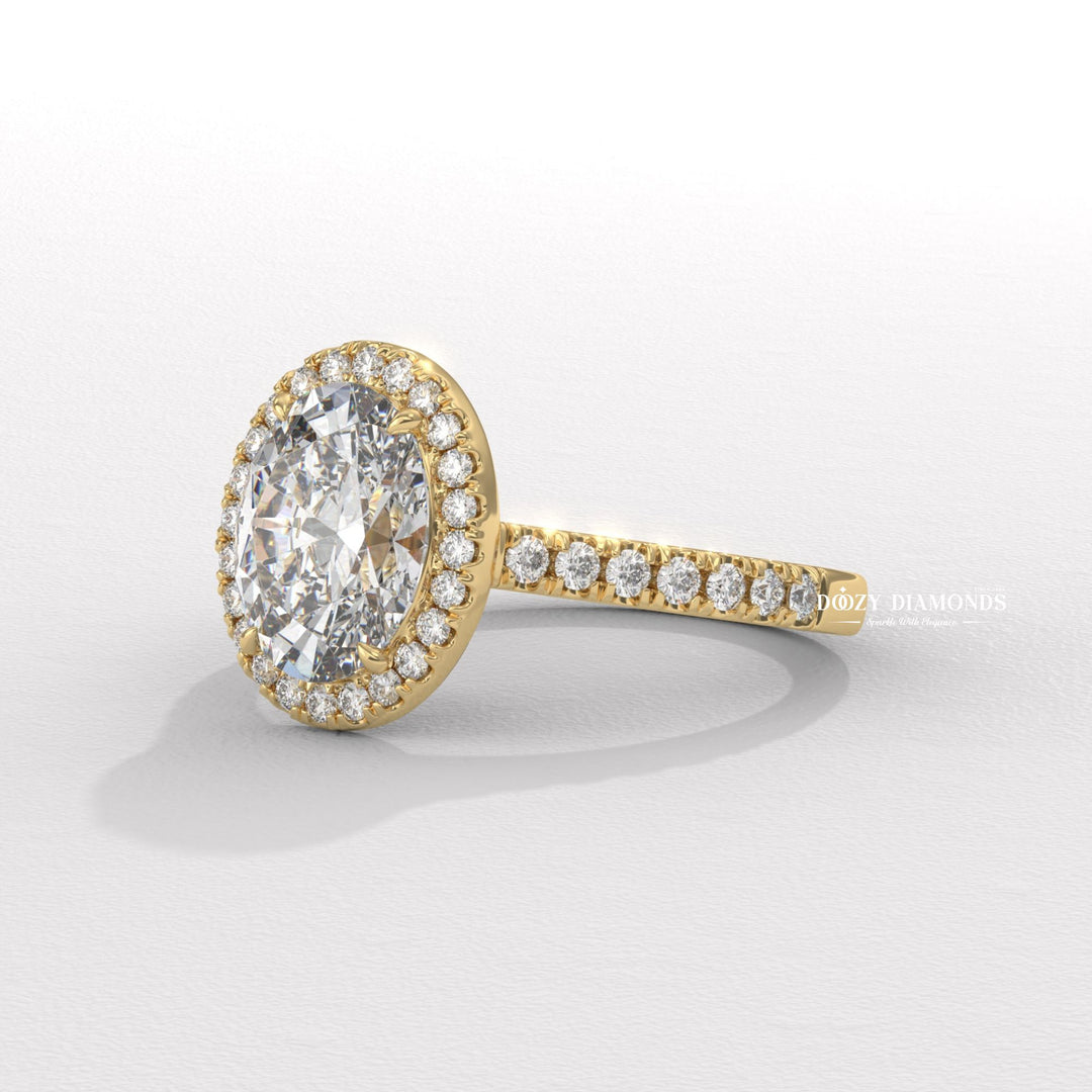 Lifestyle shot of oval halo diamond ring on hand