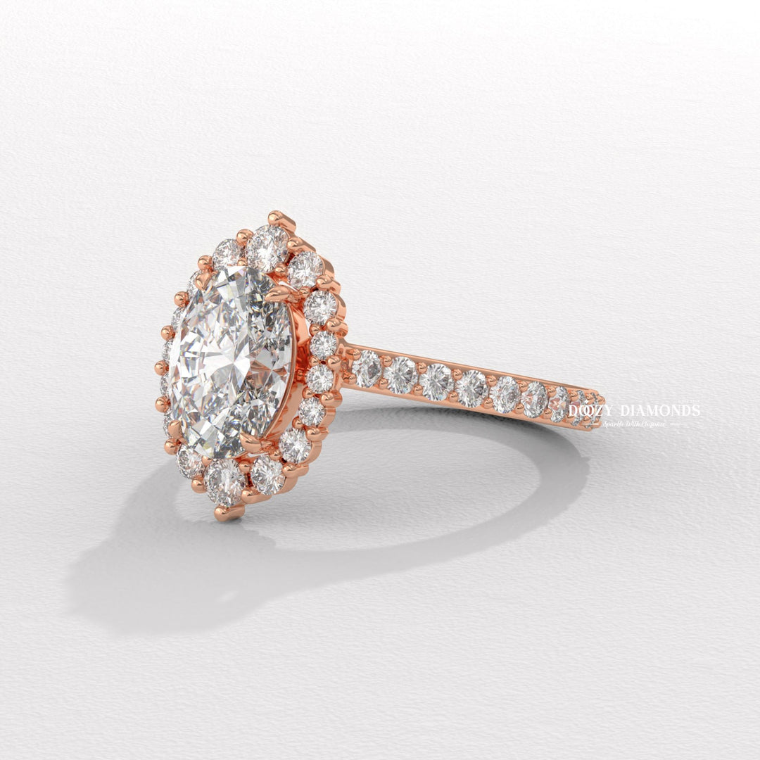 Lifestyle shot of oval halo diamond ring on hand