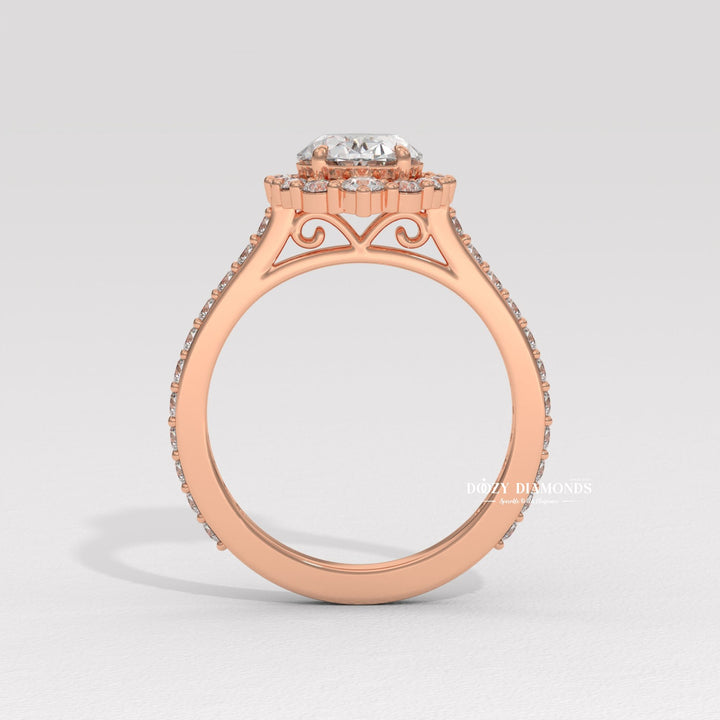 Oval cut halo engagement ring shown in real-life wear