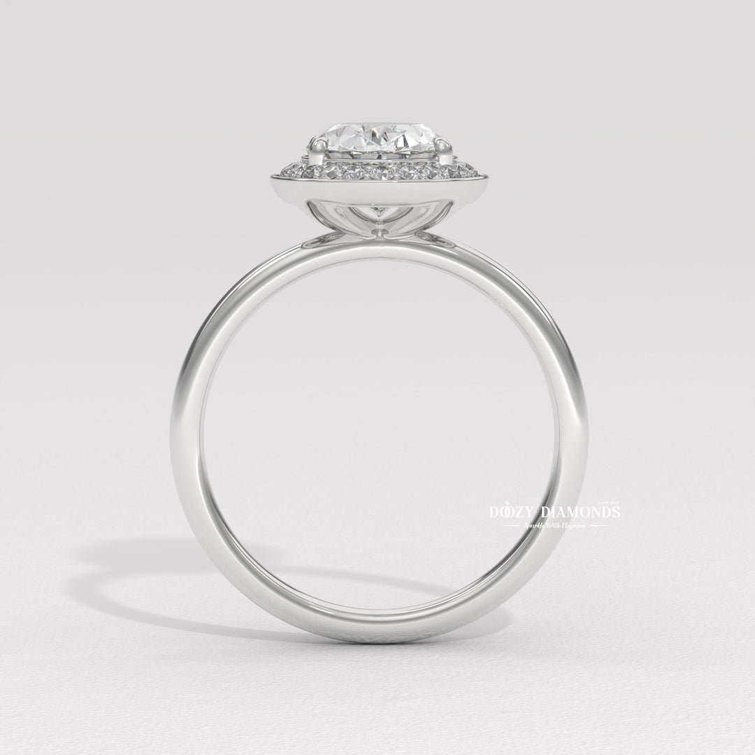 Oval halo diamond ring presented in signature gift packaging
