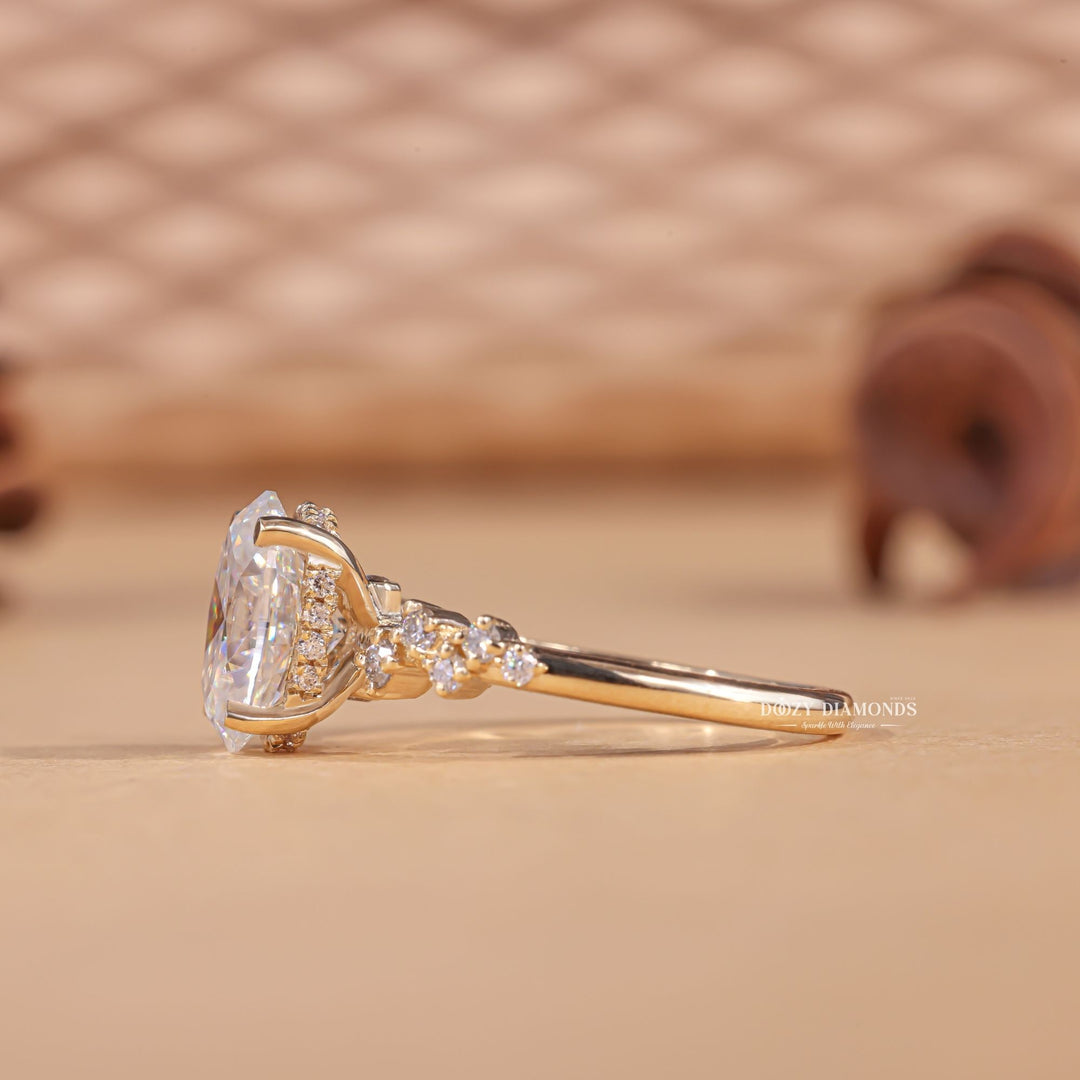 Macro shot of oval cut diamond facets in pave ring setting
