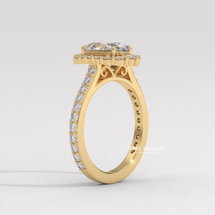 Profile view of oval cut halo engagement ring band