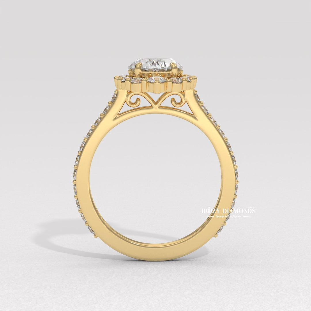 Oval halo engagement ring viewed from the side