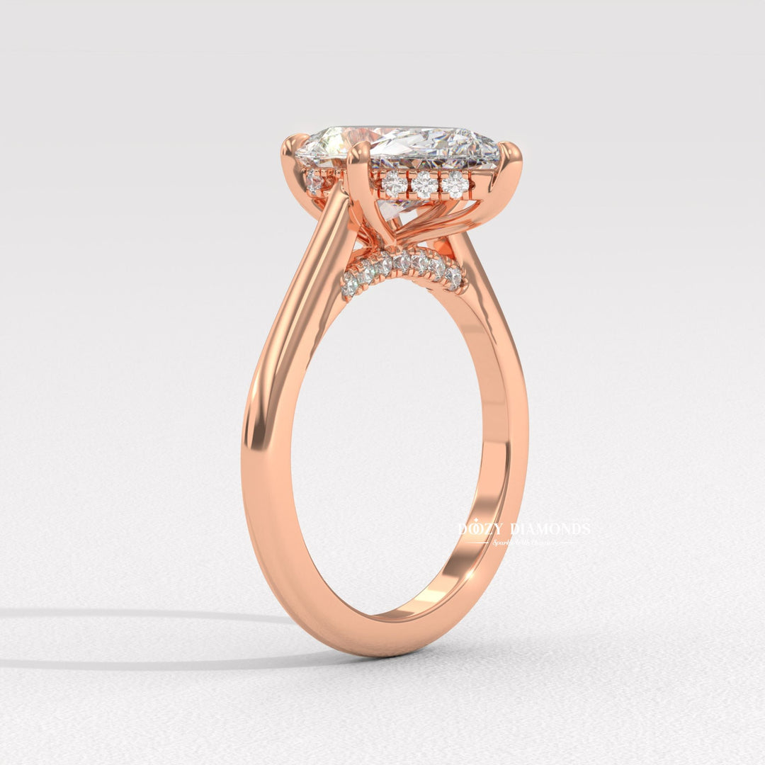 Top-down view of pear cut solitaire engagement ring