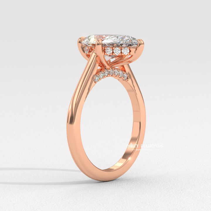 Top-down view of pear cut solitaire engagement ring