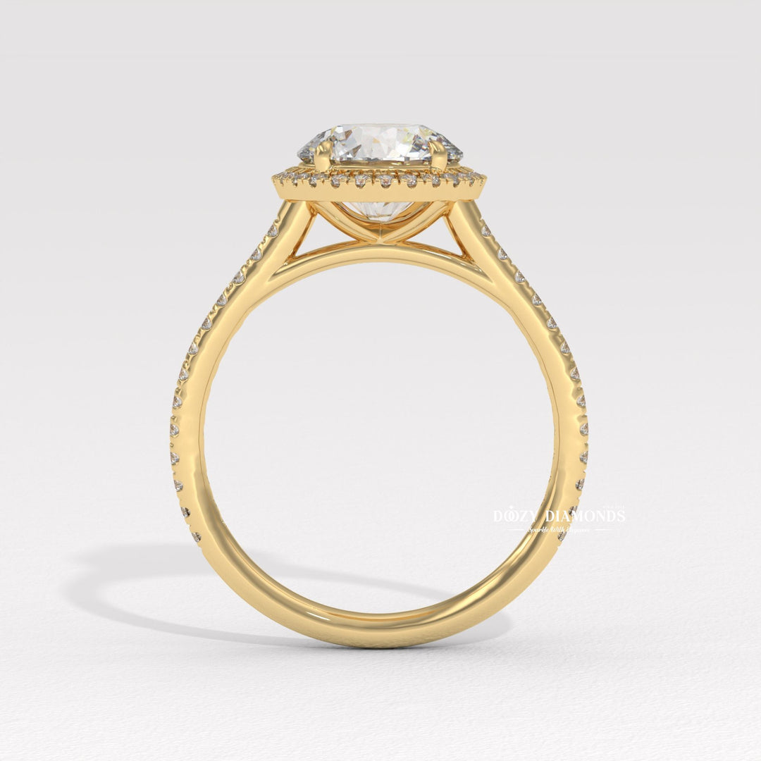 Round halo engagement ring photographed in natural light