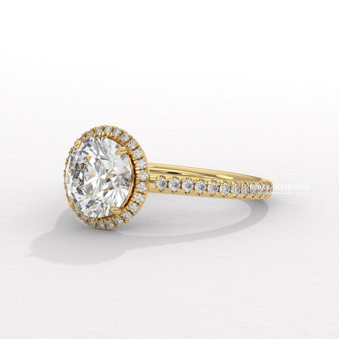 Top-down view of round cut halo engagement ring