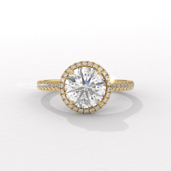 Round cut halo engagement ring available to buy now