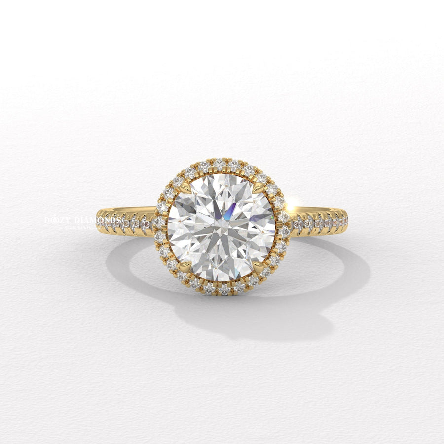 Round cut halo engagement ring available to buy now