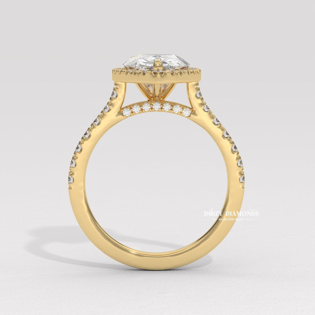 Pear halo engagement ring close-up showing high clarity diamond clarity