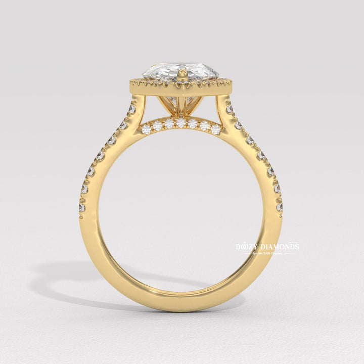 Pear halo engagement ring close-up showing high clarity diamond clarity