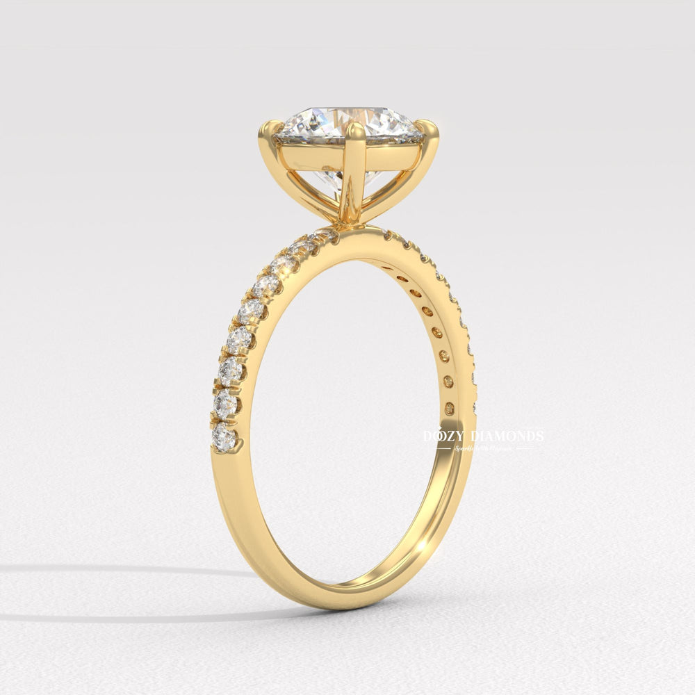Angled view of round cut diamond in pave setting
