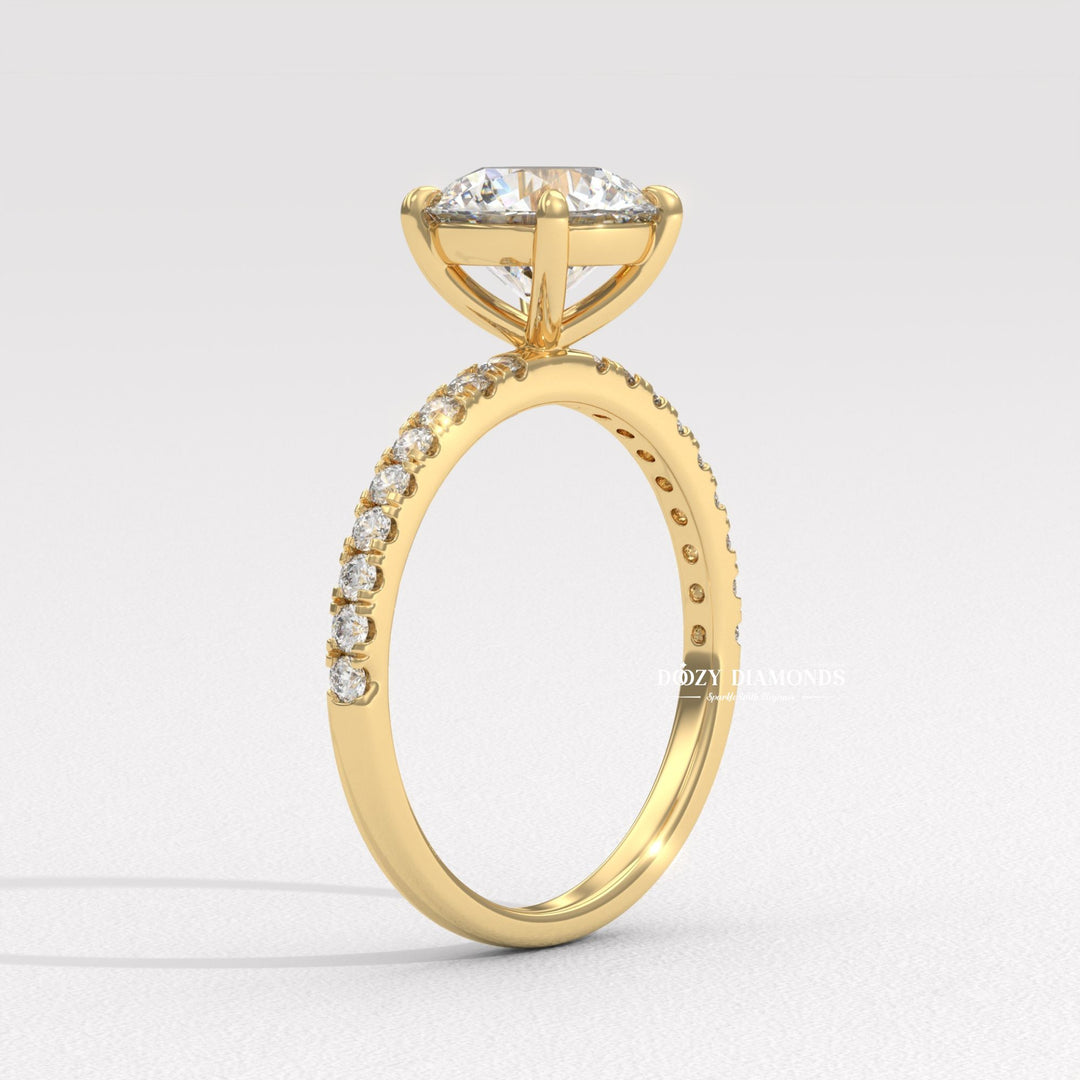 Angled view of round cut diamond in pave setting