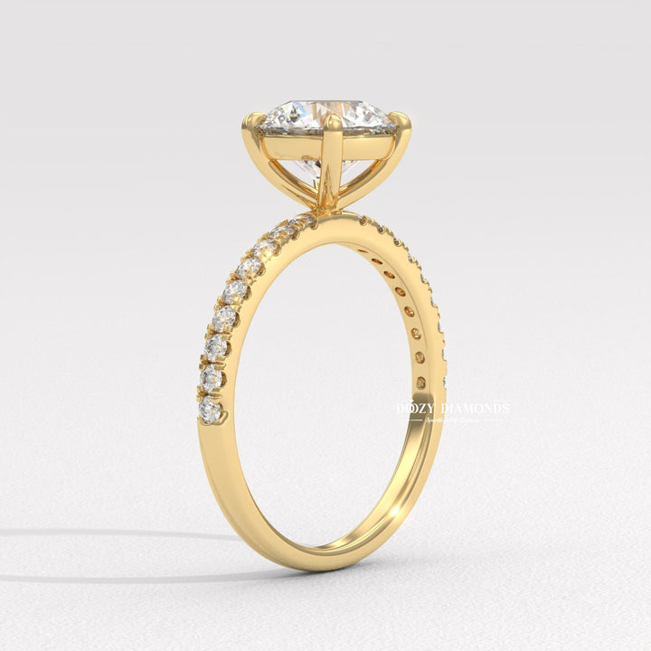 Angled view of round cut diamond in pave setting