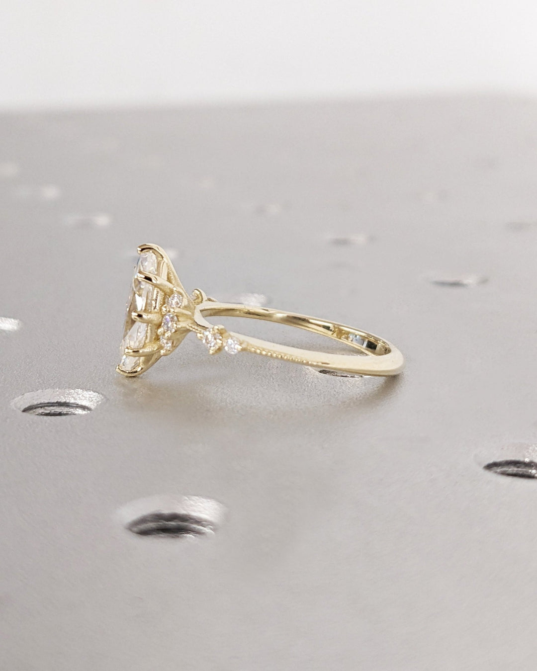Marquise cut engagement ring side view showing band detail