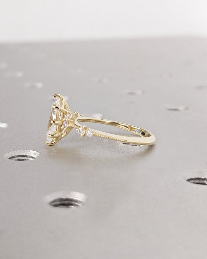 Marquise cut engagement ring side view showing band detail
