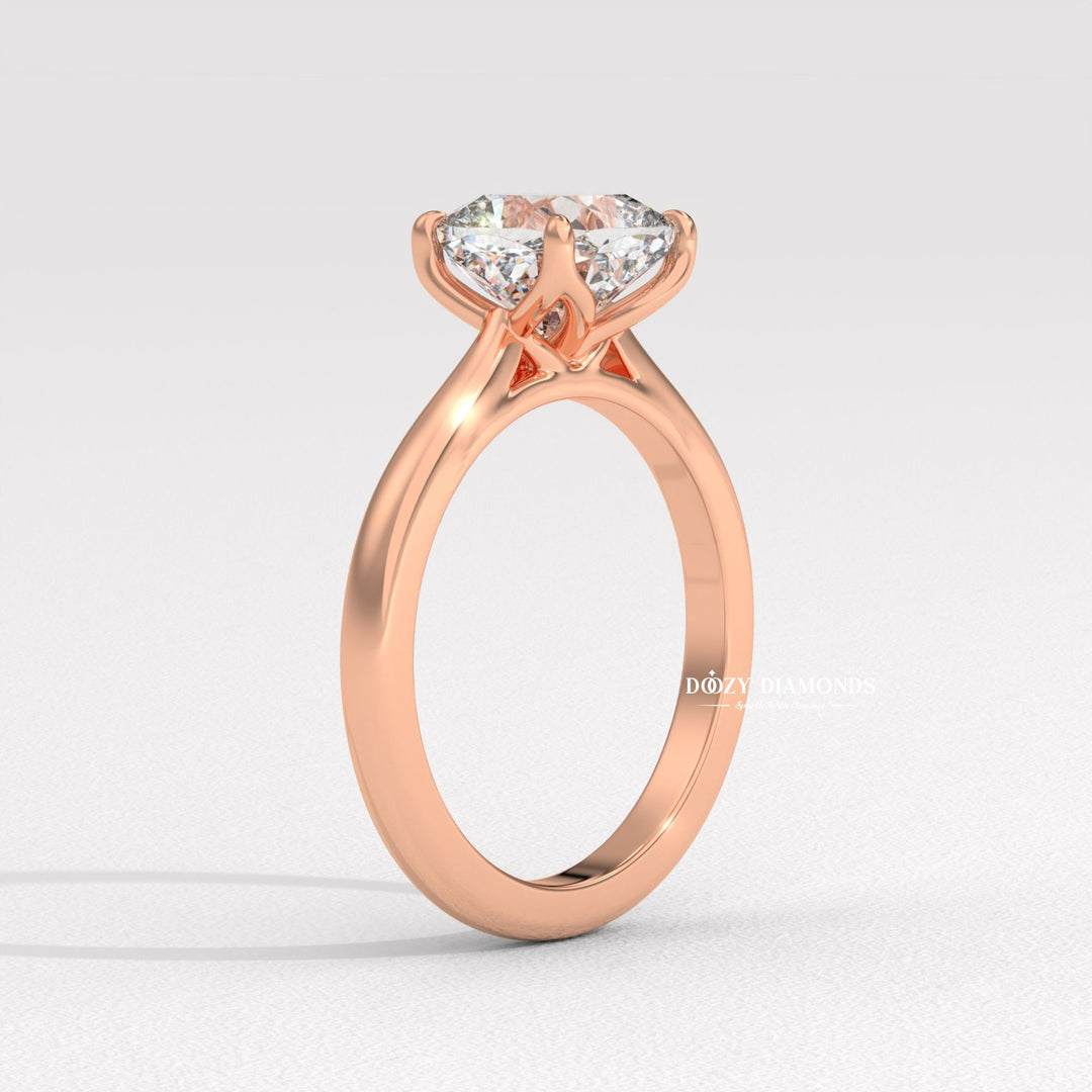 Cushion solitaire engagement ring close-up showing E/VS2 diamond clarity