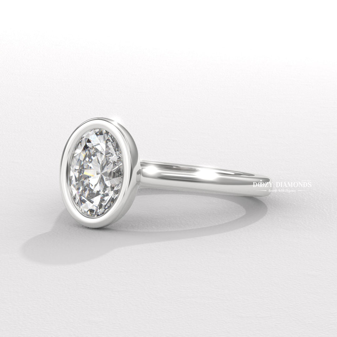 Side angle of oval bezel diamond engagement ring