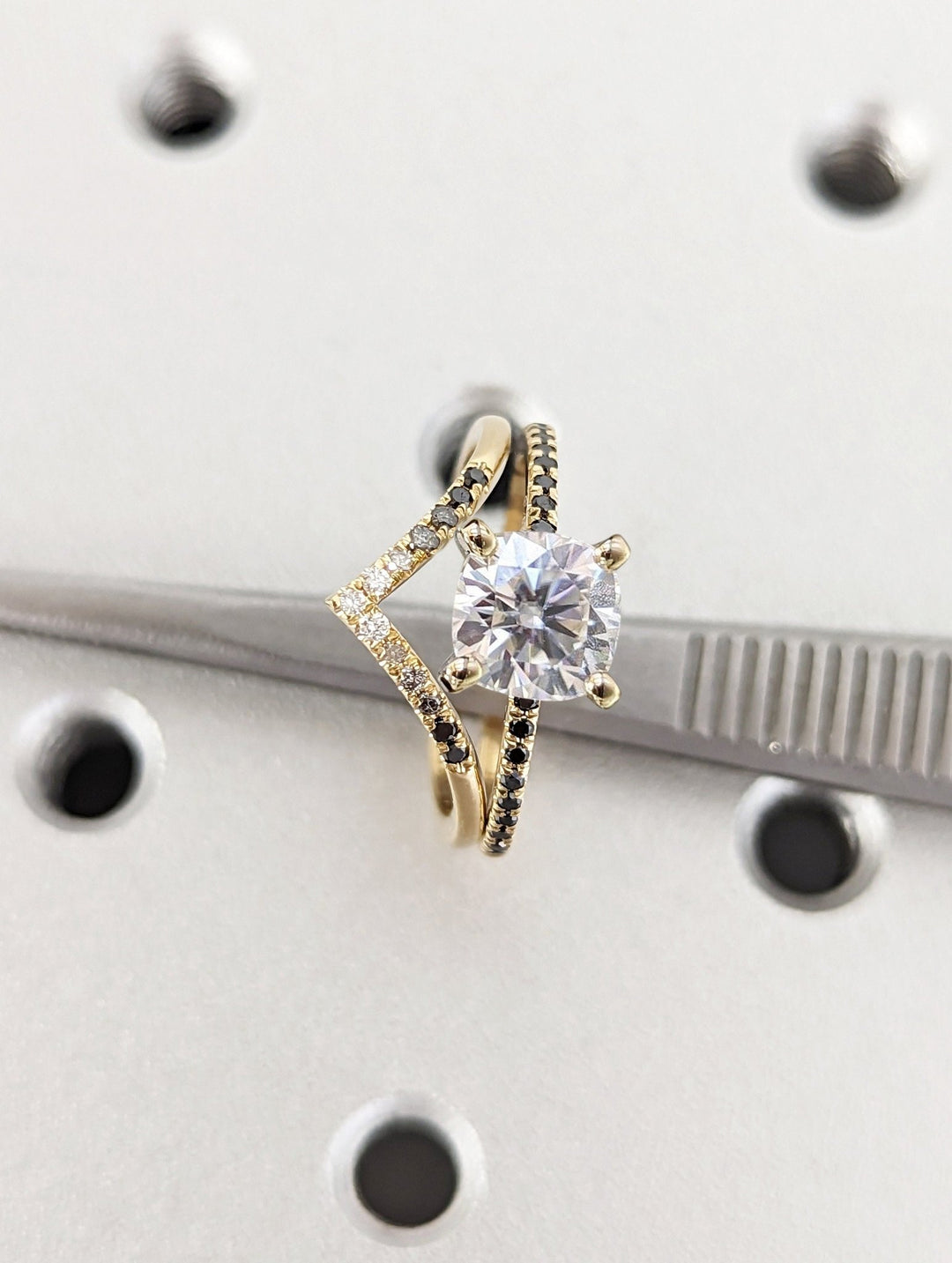 Unboxing view of cushion cut pave diamond engagement ring