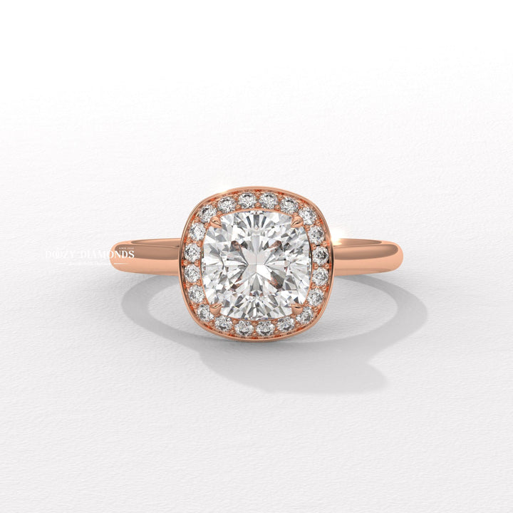 Cushion halo engagement ring offered in gold and platinum